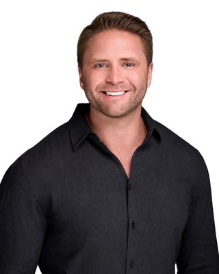 Portrait of Ryan McGinniss, REALTOR®.
